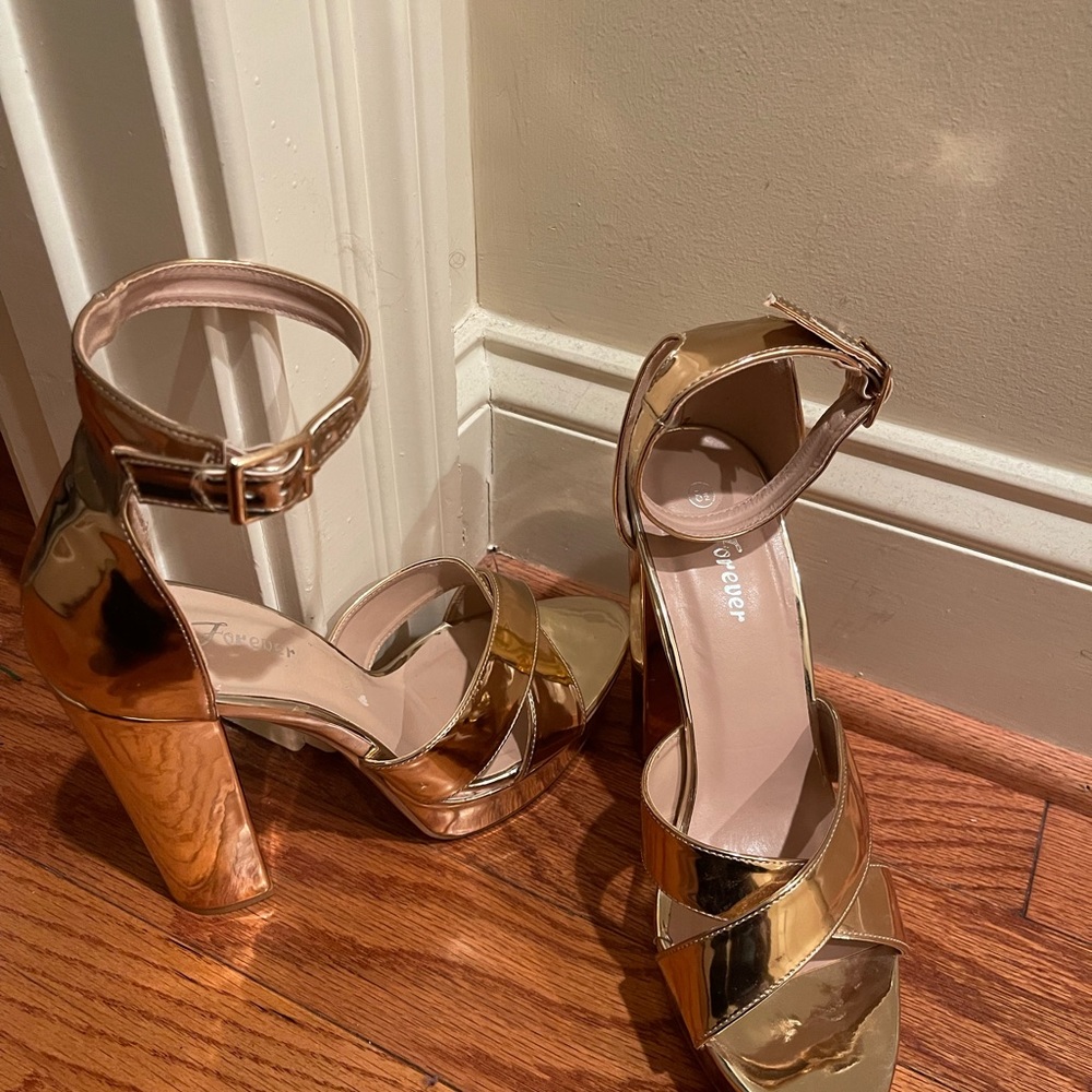 Gold/Rose Gold size 8.5 worn twice. Nearly new